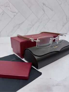 Cartier SUNGLASSES WITH ELONGATED C DE CARTIER MOTIF